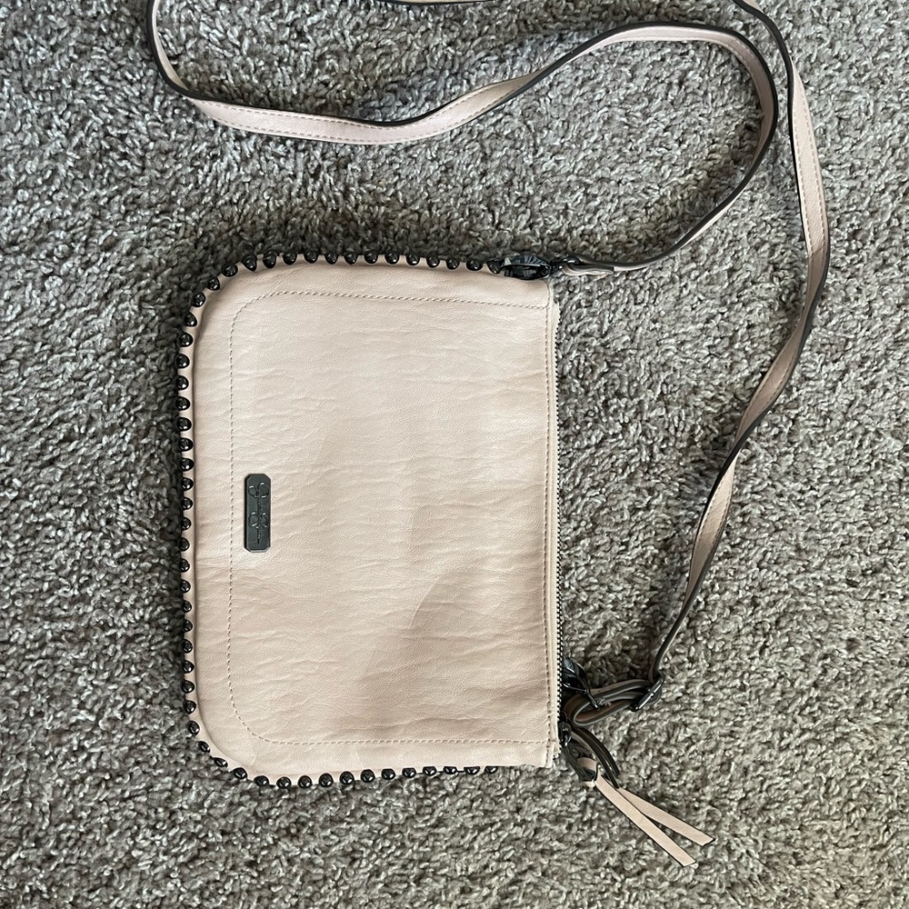 Elegant Blush Pink Jessica Simpson Crossbody Bag with Black Accents